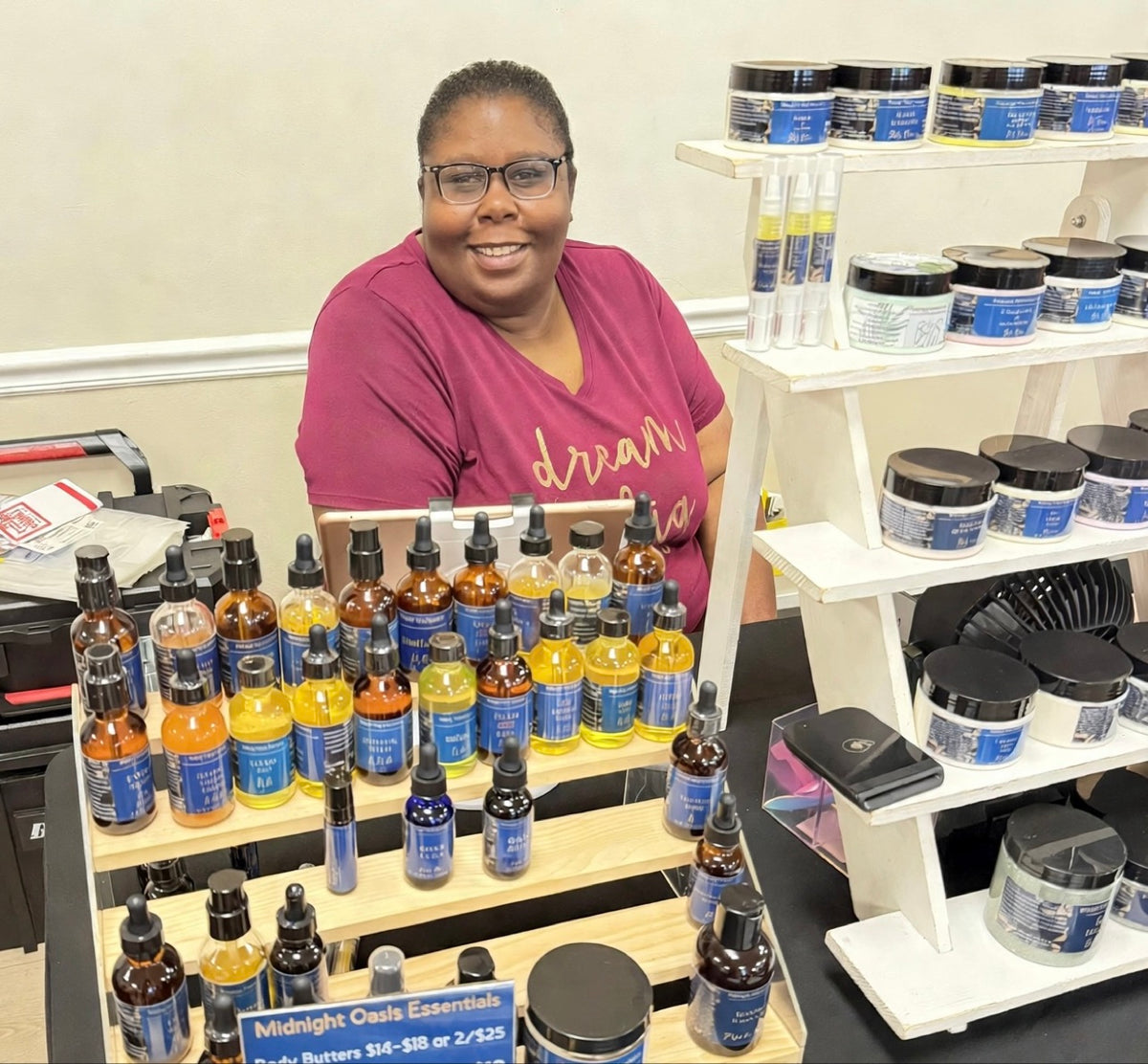 Crystal at her Midnight Oasis Essentials market table